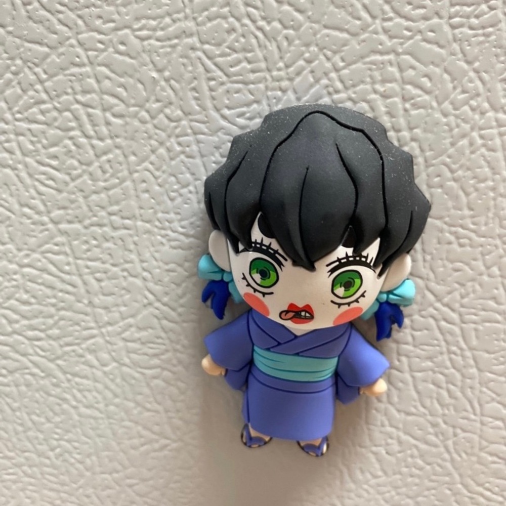 Kids Toy Figure with Black Hair and Blue Outfit